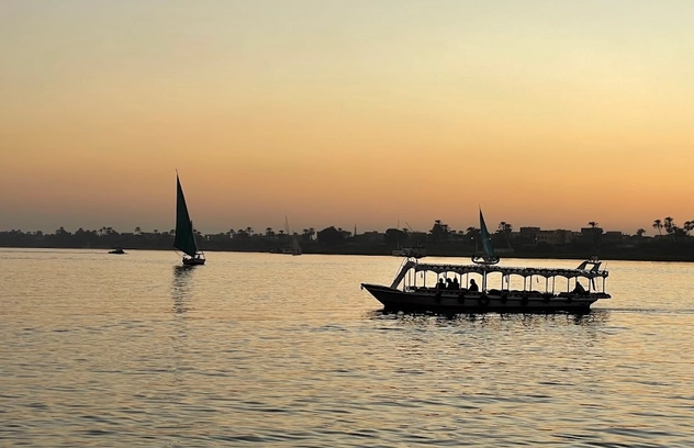 Nile cruise boat sailing between Aswan and Luxor